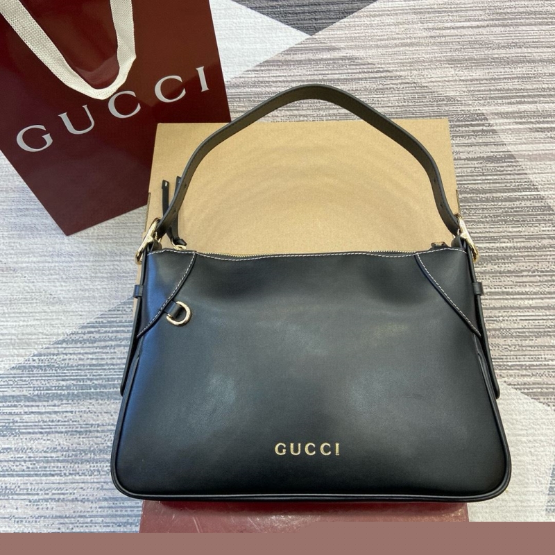 G*u*i top handle bags